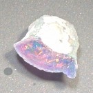 Opal, svart fra Etiopia Rå 0,86 gram AAA-kvalitet thumbnail