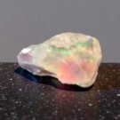 Opal, svart fra Etiopia Rå 1,37 gram AAA-kvalitet thumbnail