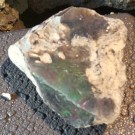 Opal, svart fra Etiopia Rå 1,19 gram AAA-kvalitet thumbnail