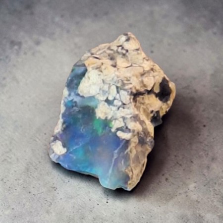 Opal, svart fra Etiopia Rå 1,27 gram, AAA-kvalitet