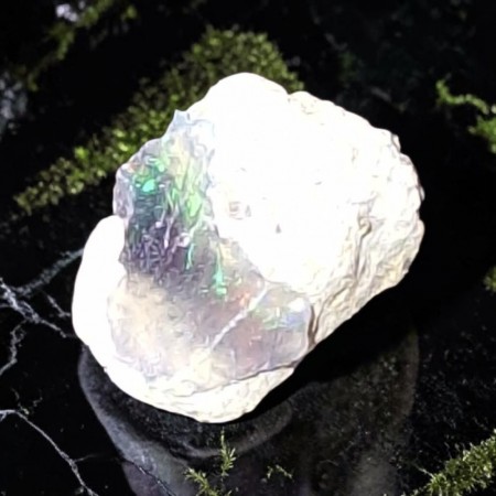 Opal, svart fra Etiopia Rå 0,54 gram AAA-kvalitet